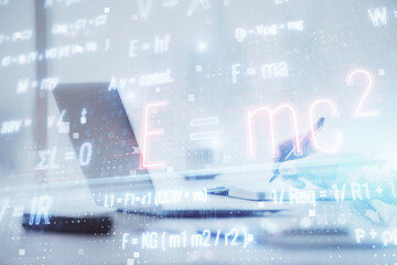 Science formula hologram with man working on computer on background. Education concept. Double...