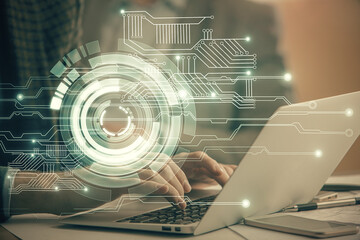 Businessman with computer background with technology theme hologram. Concept of big data. Double...