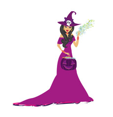 beautiful witch standing with pumpkin full of candy