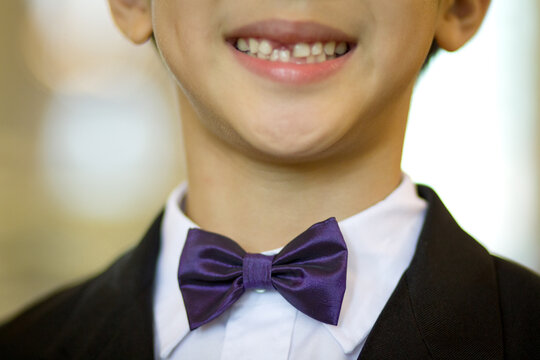 Smiling boy in formal wear