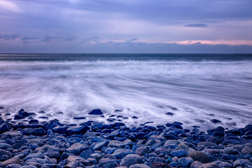 Sunset over the beach at Talisker Bay, Isle of Skye, Scotland