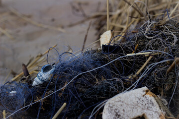 Fishing blue nets on the beach 