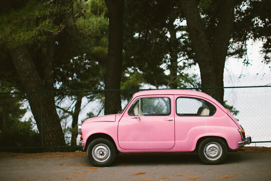 Tiny pink vintage car