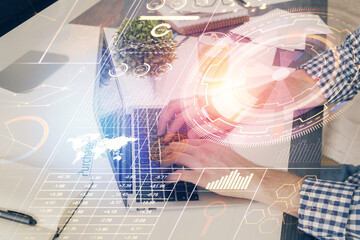 Multi exposure of tech drawings with man working on computer background. Concept of innovation.