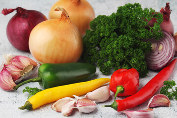 Different spices: onion. garlic, parsley and pepper