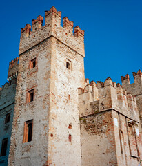 Fototapeta premium External view of the Sirmione castle (former Rocca Scaligera), on the shores of Garda Lake (Lombardy, Northern Italy); that was built in the XIII Century.