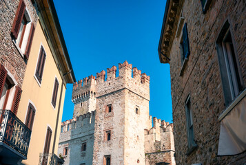 External view of the Sirmione castle (former Rocca Scaligera), on the shores of Garda Lake (Lombardy, Northern Italy); that was built in the XIII Century.