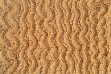 lines on the sand imitates waves