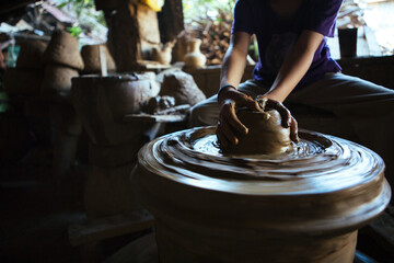 A boy's pottery session