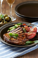 Grilled Turkey Breast with fresh salad. Close up.	