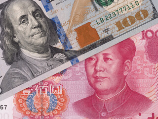 US dollar and chinese yuan banknotes, currency exchange, money closeup