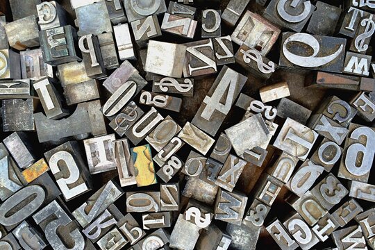 Old antique metal printing letters from a printing press