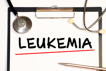 Paper with word leukemia and glasses.