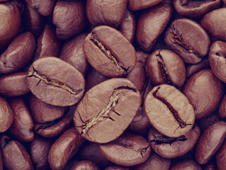 Closeup macro coffee beans background, retro isnstagram style filtered