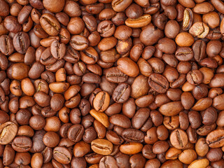 Roasted coffee beans closeup background, texture
