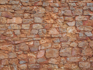 Obraz premium Old clay stone wall background, texture