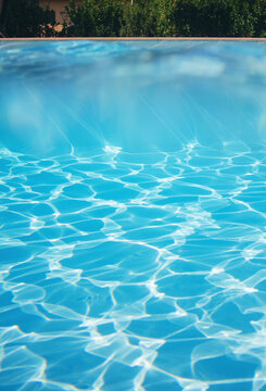 Inside and outside a swimming pool