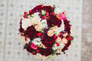 Wonderful luxury wedding bouquet of different flowers