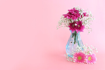 spring bouquet of pink and white flowers over pastel background