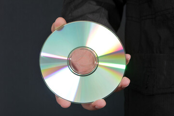 CD or DVD. Black Background.
