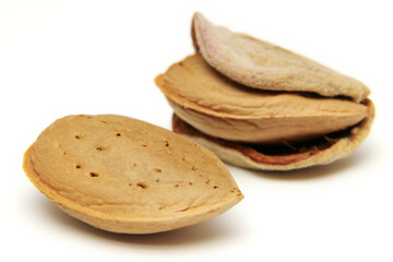 Almonds on a white background.