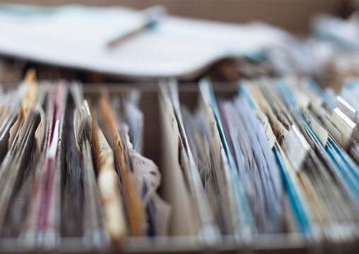 File folders full of paper in an office