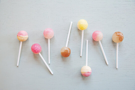 colourful lollypops on blue background