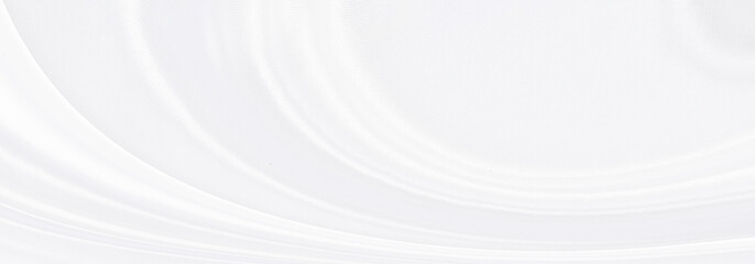 White gray satin texture that is white silver fabric silk panorama background with beautiful soft blur pattern natural.