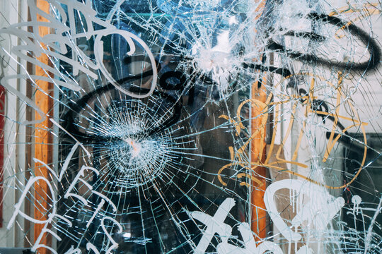 Graffiti on Shattered Glass Door
