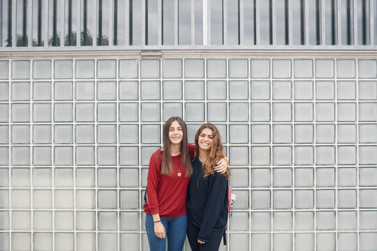 Portrait of two girlfriends at school