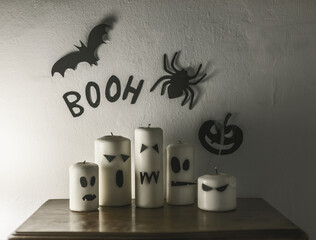Diy halloween decoration made by funny candle ghosts.