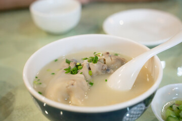 Pig feet soup, a traditional Sichuan cuisine in China.