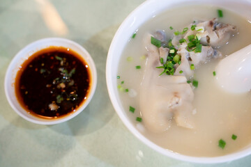 Pig feet soup, a traditional Sichuan cuisine in China.