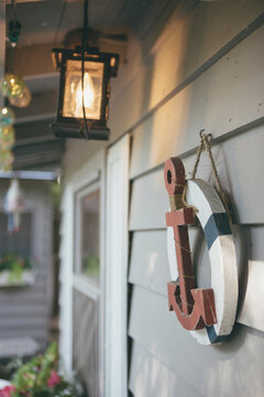 Wood Anchor as Rustic Home Decoration in Nautical Theme on a Waterfront Country Cottage