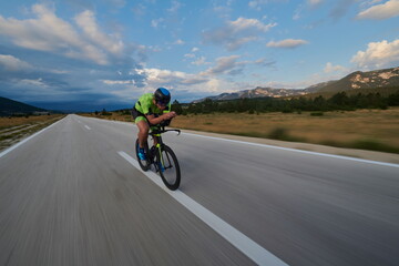 triathlon athlete riding bike