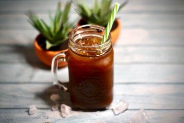 iced coffee with a reusable straw