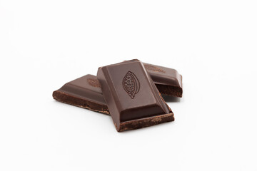 ounces of dark chocolate in front of white background