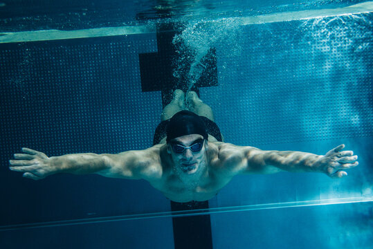 man swimming underwater