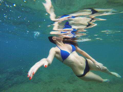 Young woman swimming