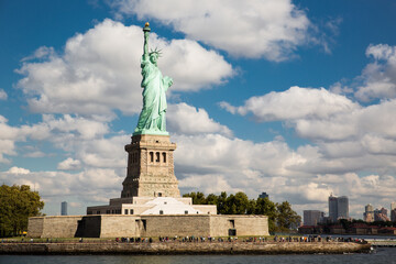 Fototapeta na wymiar Statue of Liberty National Monument in a cloudy day. Liberty island, New York, Usa