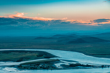 The sunset landscape of yellow river winding up in Ruoergai grassland, in Sichuan, China.