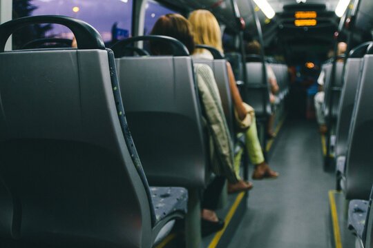 Public transport bus seats and passengers