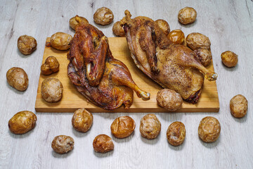 Crispy baked duck with potatoes