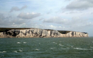 white cliffs of dover grass clear sky sea england