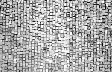 Stone pavement texture in black and white.