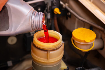 Add brake fluid to the car engine.