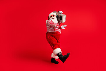 Full length body size view of his he handsome bearded fat overweight cheerful cheery glad Santa...