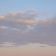 Clouds in the evening sky. Twilight sky as background.