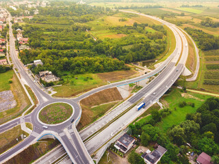 Road junction with roundabouts. Highway. Drone, aerial view.