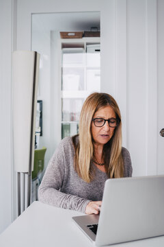 Senior Woman in Home Office